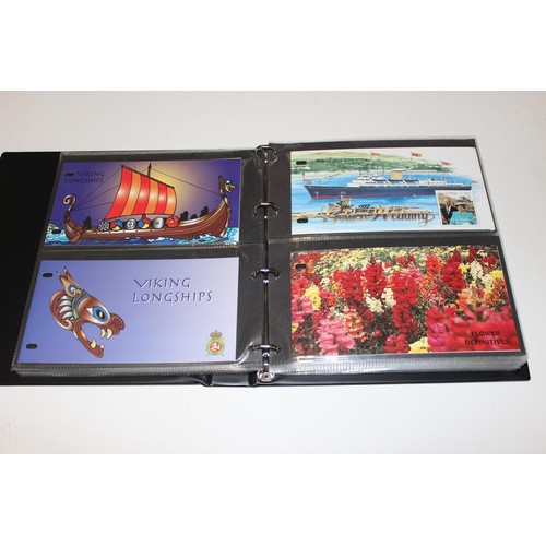 528 - Stamps - Isle of Man albums of presentation packs, 1991-1999, in red Stanley Gibbons albums, 111 pac... 