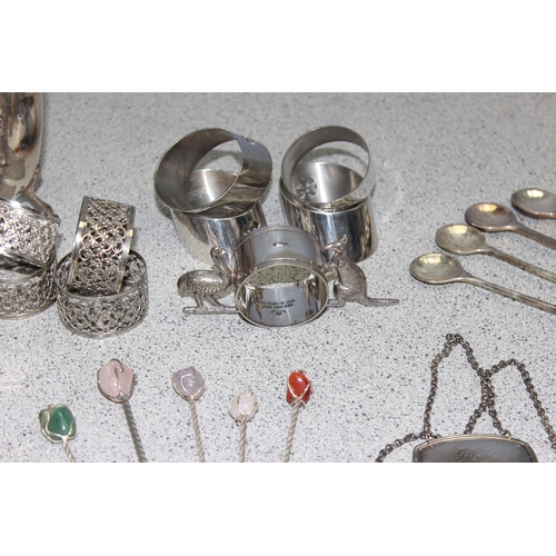 1099A - Mixed lot of interesting silver plated items to include napkin rings, decanter labels and a silver p... 