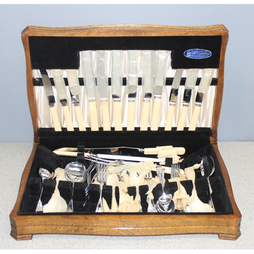 1099F - Vintage oak canteen of silver plated cutlery by Sheffield Cutlery, seemingly unused