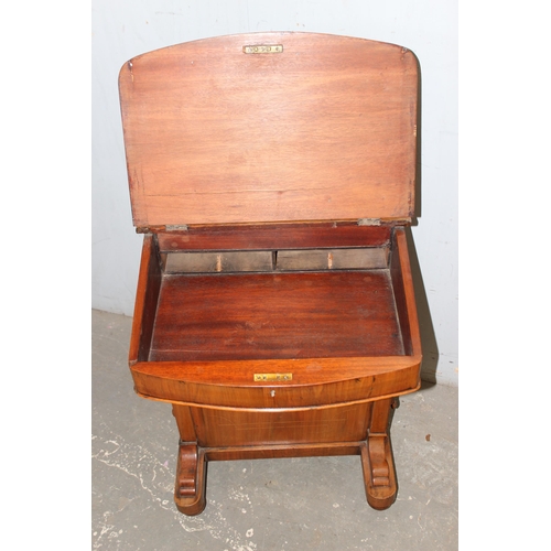 129 - A 19th century walnut Davenport desk with leather inset top and 4 drawers to one side and 4 false dr... 