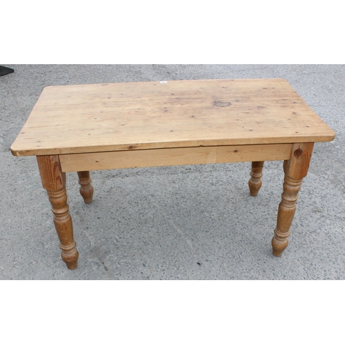 140 - A vintage pine farmhouse kitchen dining table, approx 137cm wide x 75cm deep x 77cm tall