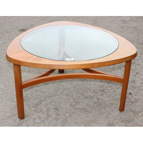 145 - A retro glass topped coffee table, likely by Nathan from the Astro range, approx 76cm wide x 76cm de... 