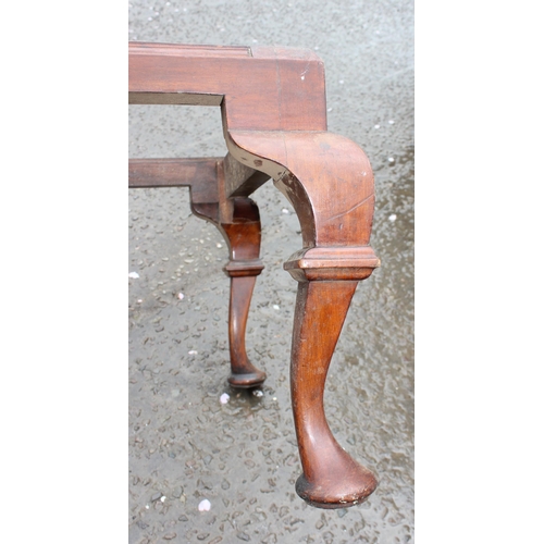 150 - An antique mahogany large stool frame with cabriole legs, possibly a fender stool, approx 100cm wide... 