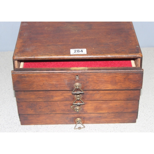 284 - Interesting mahogany table top collectors chest of drawers, the drawer below the top opens all, appr... 