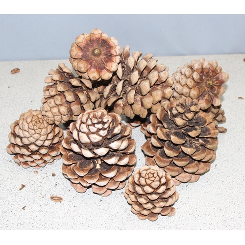 288 - Vintage wicker basket full with large pine cones, approx 44cm tall