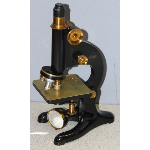 665 - A vintage Beck of London Model 29 microscope in original oak box