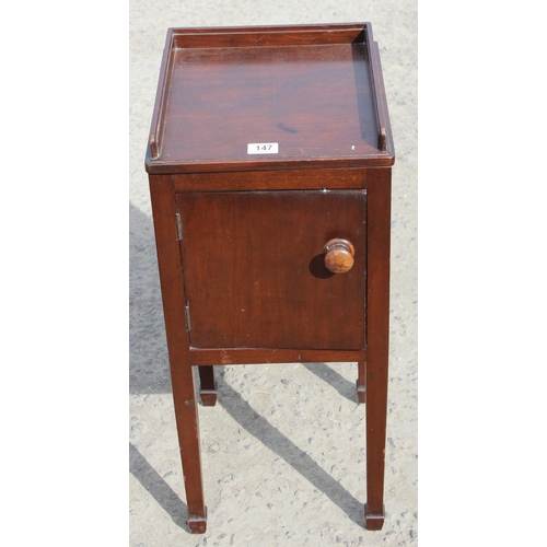 50 - A Victorian mahogany bedside cupboard with bun handle and spade legs, approx 32cm wide x 33cm deep x... 