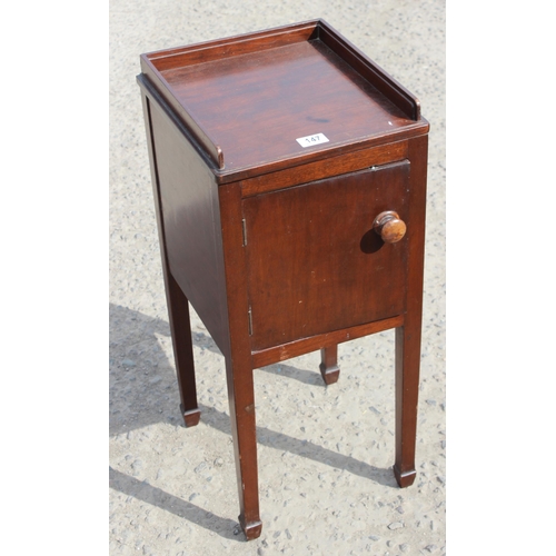 50 - A Victorian mahogany bedside cupboard with bun handle and spade legs, approx 32cm wide x 33cm deep x... 