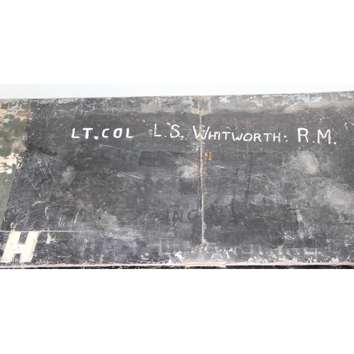 1413 - Two black painted metal military trunks, largest approx 91cm wide x 54cm deep x 41cm tall