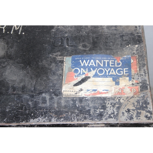 1413 - Two black painted metal military trunks, largest approx 91cm wide x 54cm deep x 41cm tall