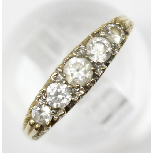 1181 - 9ct gold and white stone ring in scrollwork setting, marked for London 1983, approx Size O & approx ... 