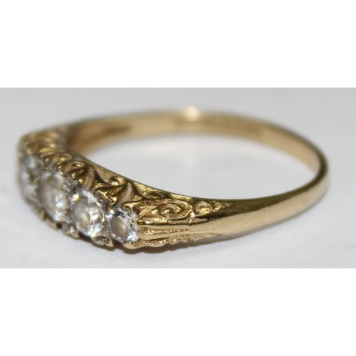 1181 - 9ct gold and white stone ring in scrollwork setting, marked for London 1983, approx Size O & approx ... 