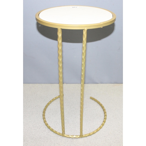 128 - Mid 20c gilt brass and marble topped circular side table in the manner of designer Eileen Gray, appr... 