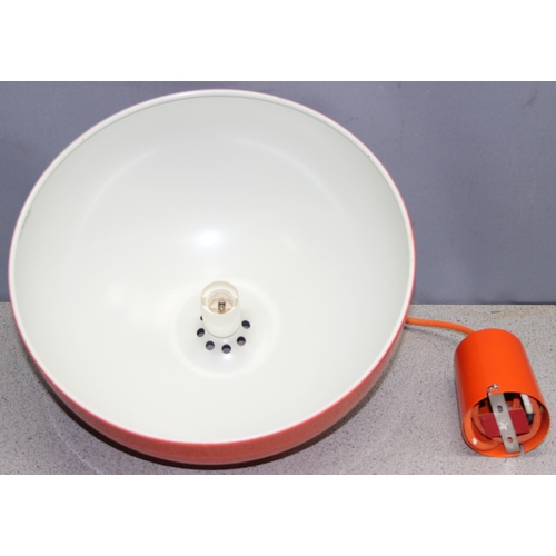 258 - A retro style bright orange metal pendant ceiling light shade with colour coordinated flex, approx 3... 