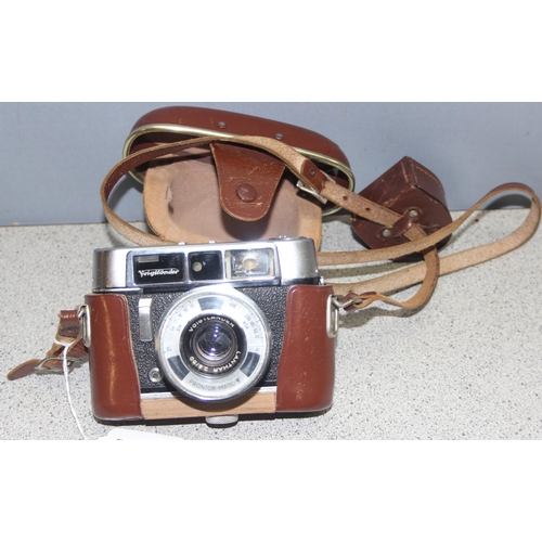 660 - Early 1960’s rare model Voigtlander Dynamatic II 35mm automatic camera with all round lens, two addi... 