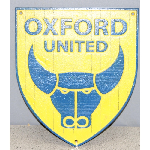 728 - Cast metal Oxford United wall mounted shield in team colours. 30cm x 27cm