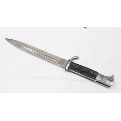 1401 - An unusual WW2 period German bayonet by E & F Horster of Solingen, the handle scales inlaid with a b... 