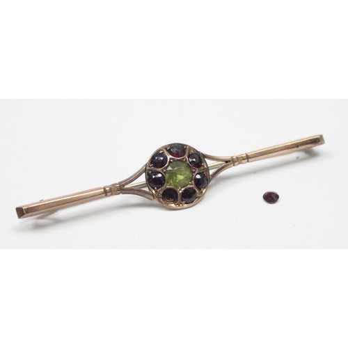 1179 - An antique 9ct gold Peridot and Garnet bar brooch, marked 9ct and XRF confirmed, approx 65mm wide, a... 