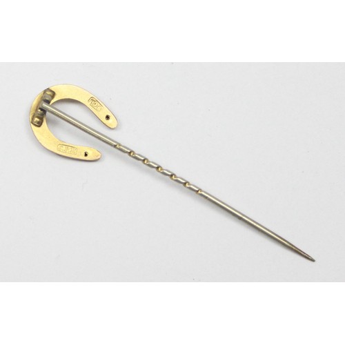 1180 - An antique 9ct gold stick pin formed as a lucky horseshoe, marked 9ct and XRF confirmed, approx 0.84... 