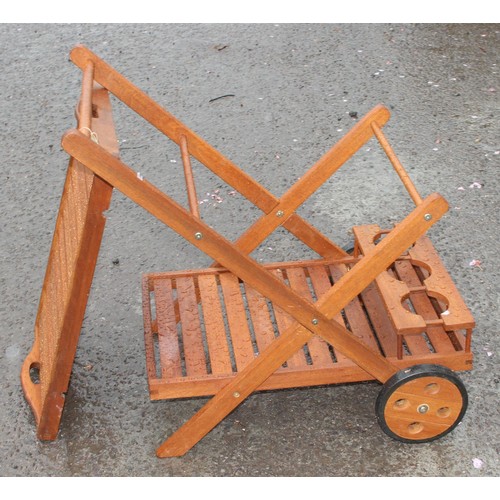 346 - A teak garden serving trolley, approx 79cm wide x 50cm deep x 76cm tall