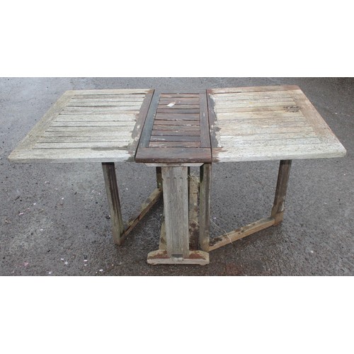 357 - A folding teak garden table and a teak chair, table approx 155cm wide x 90cm deep x 75cm tall