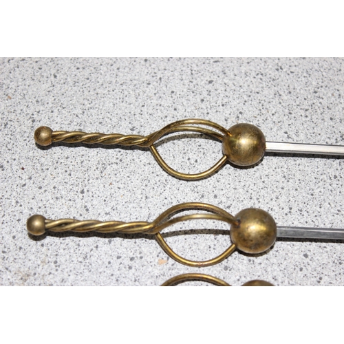 1081 - A set of 8 vintage German made steel and brass meat skewers, each approx 30cm long