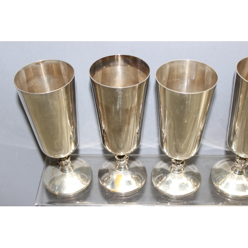 1085 - A set of 8 vintage silver plated champagne flutes by Plator of Spain, each approx 16cm tall