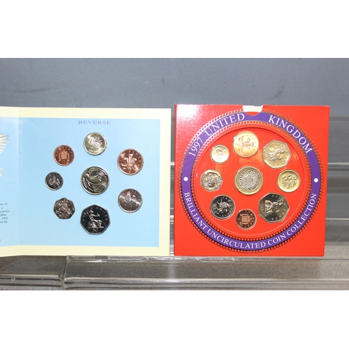 1299R - Great Britain & Northern Ireland Brilliant Uncirculated coinage sets, 9 BU coin sets in folders, dat... 