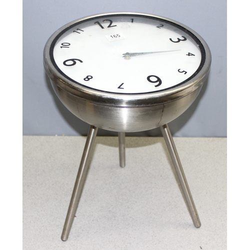 165 - An unusual retro style stainless steel side table, the top formed as a clock, approx 35cm in diamete... 