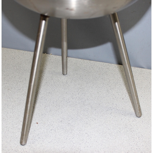 165 - An unusual retro style stainless steel side table, the top formed as a clock, approx 35cm in diamete... 