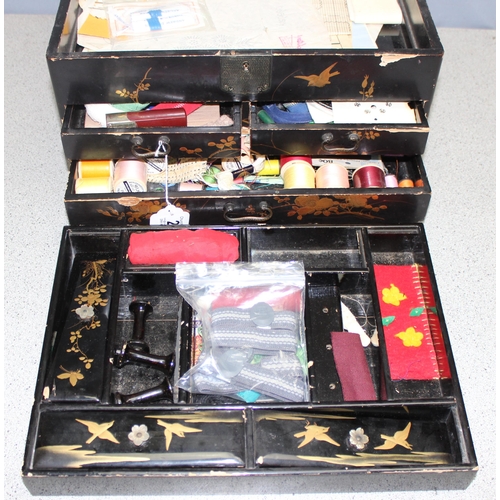 299 - A Japanese black lacquer and shibayama inlaid sewing box and contents, likely early 20th century, ap... 