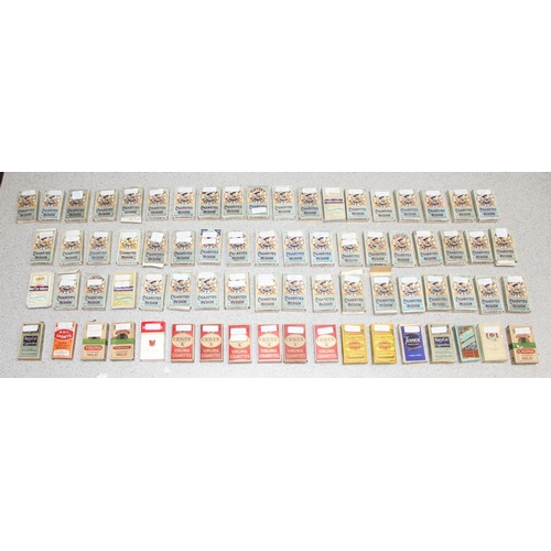 575 - A large qty of assorted cigarette cards, many in vintage Player's Cigarette packaging