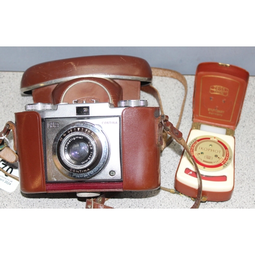 670 - Vintage Zeiss Ikon Contina Prontor -SVS camera in original case, a Zeiss Ikon Ikophot slenium light ... 