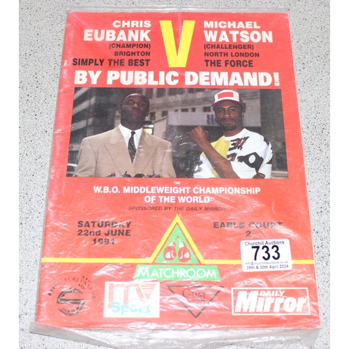 733 - A signed photograph of Michael Watson on card backing, and a 1991 Eubank Watson fight programme (2)