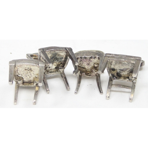 1035 - A set of 8 assorted vintage silver plated menu or place card holders formed as antique chairs to inc... 