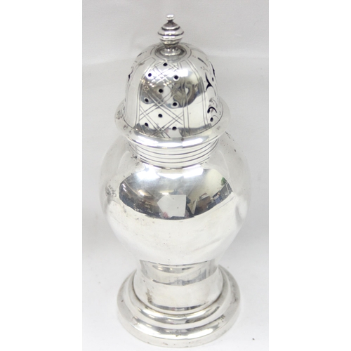 1066 - A large Edwardian silver sugar caster of bulbous form, London 1907 by Wakeley & Wheeler, approx 16cm... 