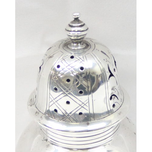 1066 - A large Edwardian silver sugar caster of bulbous form, London 1907 by Wakeley & Wheeler, approx 16cm... 