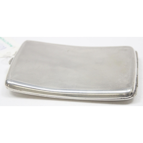 1099L - A heavy plain silver cigarette case of curved form, Birmingham 1919 by Charles S Green & Co Ltd, app... 