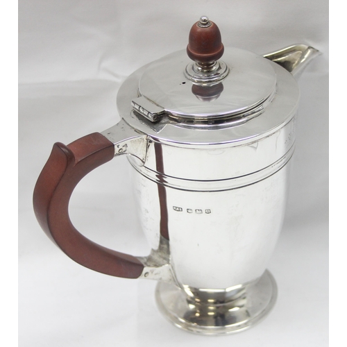 1099M - An Art Deco period silver coffee pot, Sheffield 1944 by Roberts & Belk, with wooden handle and acorn... 