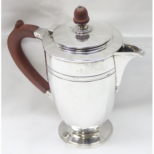 1099M - An Art Deco period silver coffee pot, Sheffield 1944 by Roberts & Belk, with wooden handle and acorn... 