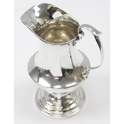 1099N - An antique Georgian style silver cream jug, Birmingham 1924 by Docker & Burn, approx 11cm tall, appr... 