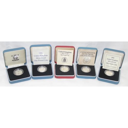 1250G - 5 boxed Royal Mint silver proof £1 coins, struck in sterling silver, boxed & 4 with paperwork