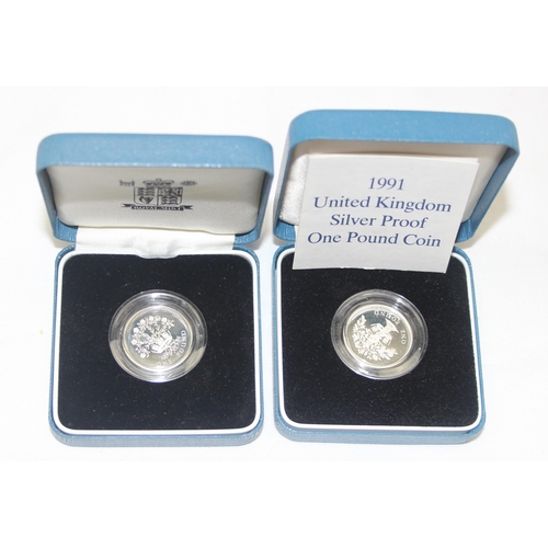 1250G - 5 boxed Royal Mint silver proof £1 coins, struck in sterling silver, boxed & 4 with paperwork