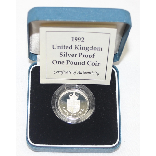 1250G - 5 boxed Royal Mint silver proof £1 coins, struck in sterling silver, boxed & 4 with paperwork