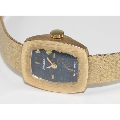 1318 - A vintage 18ct gold Nivada Swiss made watch, the retro bark effect strap and case marked 750 and wit... 