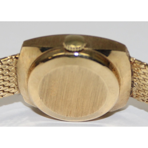 1318 - A vintage 18ct gold Nivada Swiss made watch, the retro bark effect strap and case marked 750 and wit... 