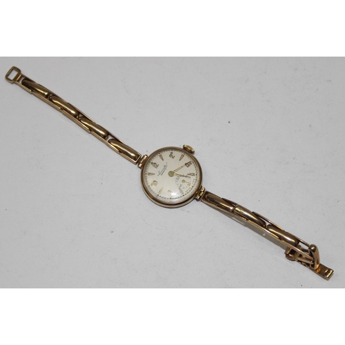 1337 - A 9ct gold cased and strapped vintage Everite ladies wrist watch, both the case and strap marked and... 