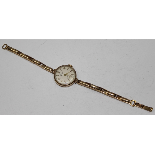 1337 - A 9ct gold cased and strapped vintage Everite ladies wrist watch, both the case and strap marked and... 