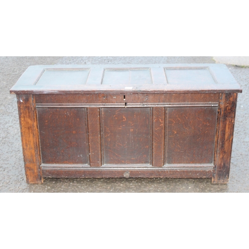 170 - An 18th century panelled oak coffer, approx 125cm wide x 53cm deep x 60cm tall