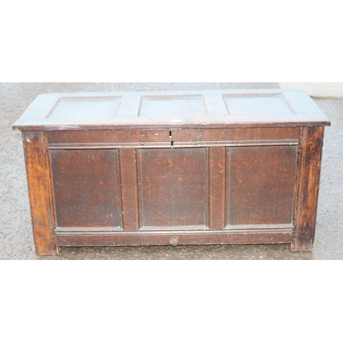 170 - An 18th century panelled oak coffer, approx 125cm wide x 53cm deep x 60cm tall